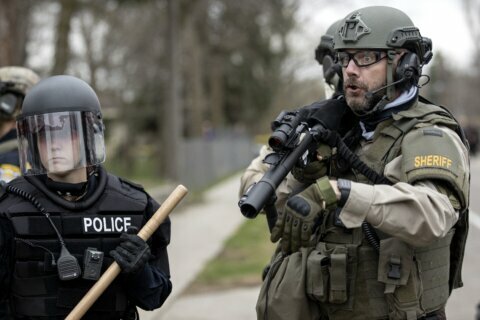Police: Minnesota officer meant to draw Taser, not handgun