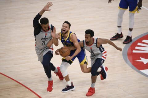 Curry finally goes cold, Beal rallies Wizards past Warriors