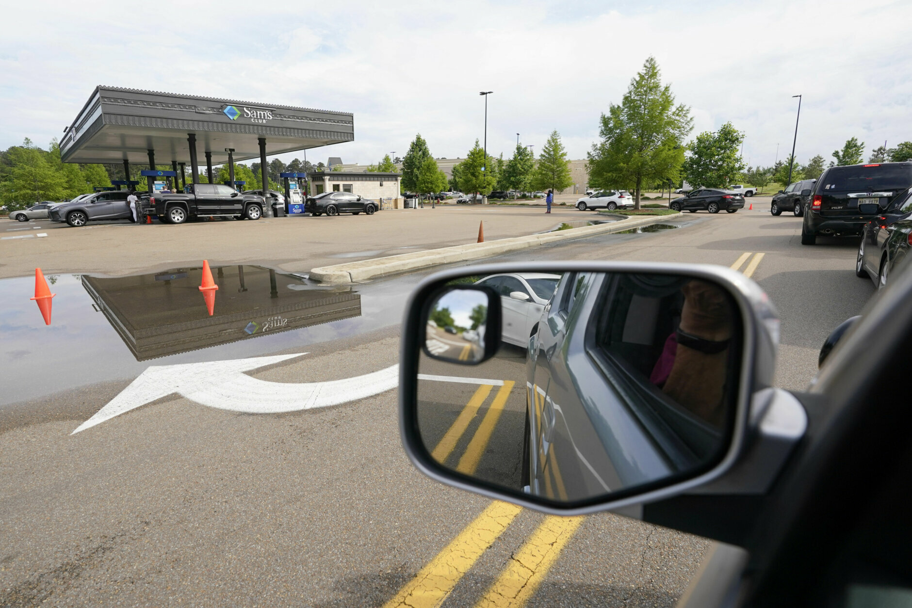 <p>The line of people filling up their vehicles was longer than usual at this Sam&#8217;s Club in Madison, Miss., Tuesday, May 11, 2021. State officials warn that any shortages seen at individual gas stations are a result of people &#8220;panic buying&#8221;, not the Colonial Pipeline shutdown itself, and call on residents to limit unnecessary travel and only buy as much gasoline as they need.</p>
