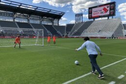At DC United’s Audi Field on Wednesday, newly vaccinated residents got a chance to take a shot on target after they got a shot in the arm.