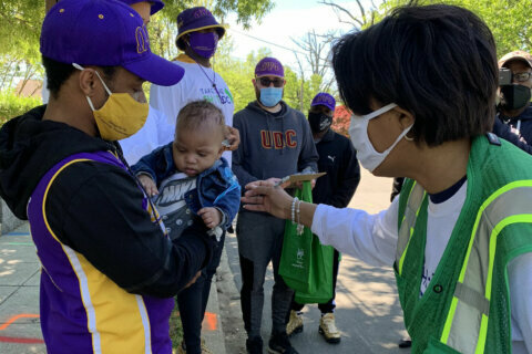 DC Mayor Bowser canvasses in support of new walk-up vaccine sites
