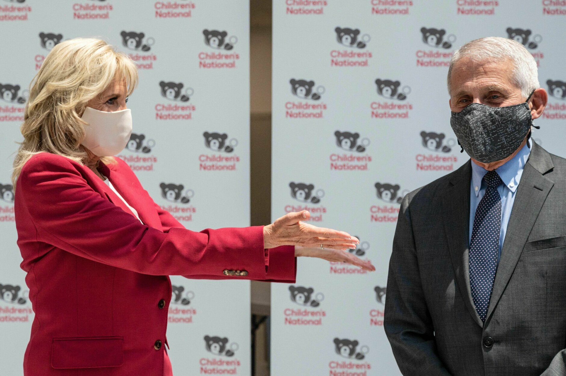 US First Lady Jill Biden and Dr. Anthony Fauci (R) tour the vaccination center at the Children's National Hospital in Washington, DC on May 20, 2021. (Photo by JIM WATSON / AFP) (Photo by JIM WATSON/AFP via Getty Images)