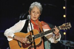 FILE - In this May 3, 2009 file photo, Joan Baez performs at a benefit concert celebrating Pete Seeger's 90th birthday at Madison Square Garden in New York. This year’s Kennedy Center Honors will be a slimmed-down affair as the nation emerges from the coronavirus pandemic. The 43rd class of honorees includes country music legend Garth Brooks, dancer and choreographer Debbie Allen, actor Dick Van Dyke, singer-songwriter Joan Baez and violinist Midori.(Photo by Evan Agostini/Invision/AP, File)