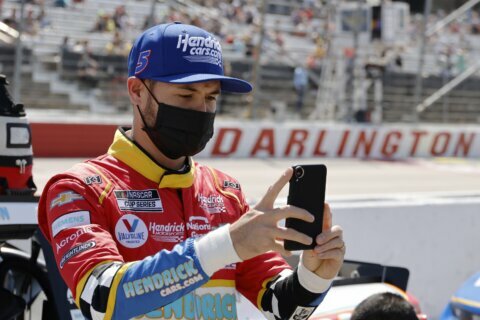 Larson repays Urban Youth Racing School with virtual visit
