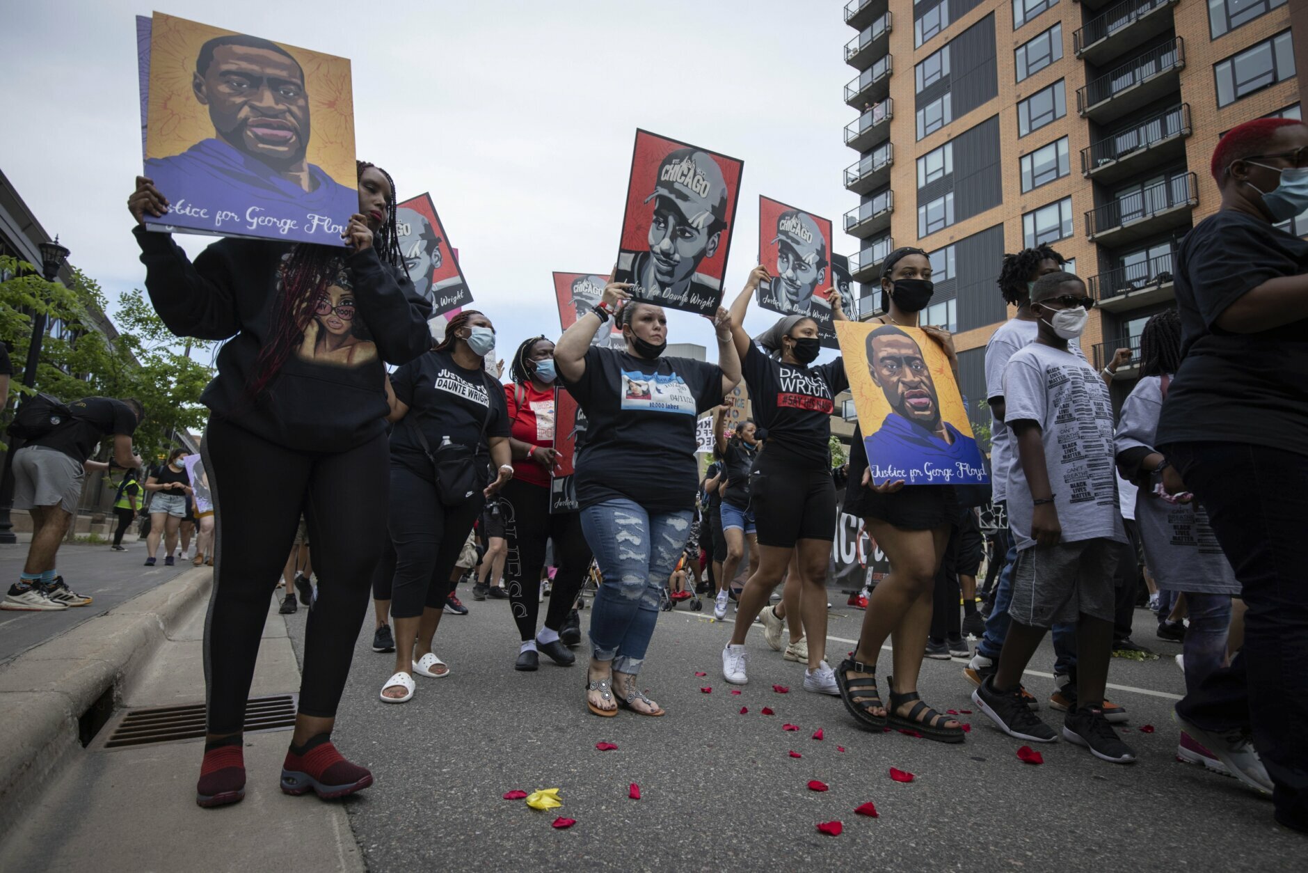 The family of Daunte Wright march for the one year anniversary of George Floyd's death on Sunday, May 23, 2021, in Minneapolis, Minn. (AP Photo/Christian Monterrosa)