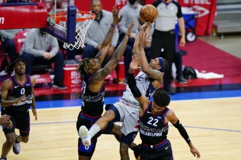 Simmons leads 76ers past Wizards; Westbrook injured
