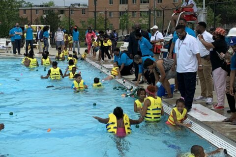 What is the ‘all-out’ policy at DC pools and why are some upset about it?