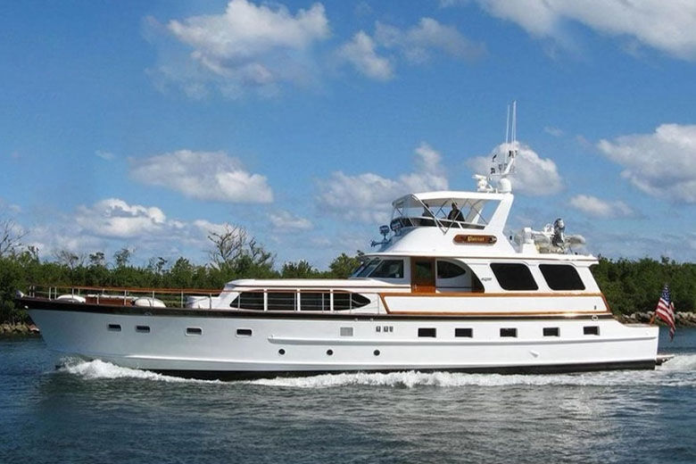 The Patriot is a 72-foot 1961 Burger Motor Yacht, originally built as “Sis W” for the Walgreen family. It has a large deck, sky bridge and two salons, and was most recently re-outfitted in 2021. (Courtesy Vintage Yacht Charters)