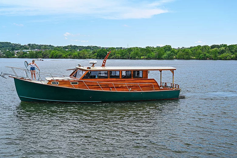 The Independence is a 42-foot Bruno &amp; Stillman Down East style yacht from 1976 that was re-outfitted in 2021, with mahogany interior and exterior finishes and marble bar countertops. (Courtesy Vintage Yacht Charters)