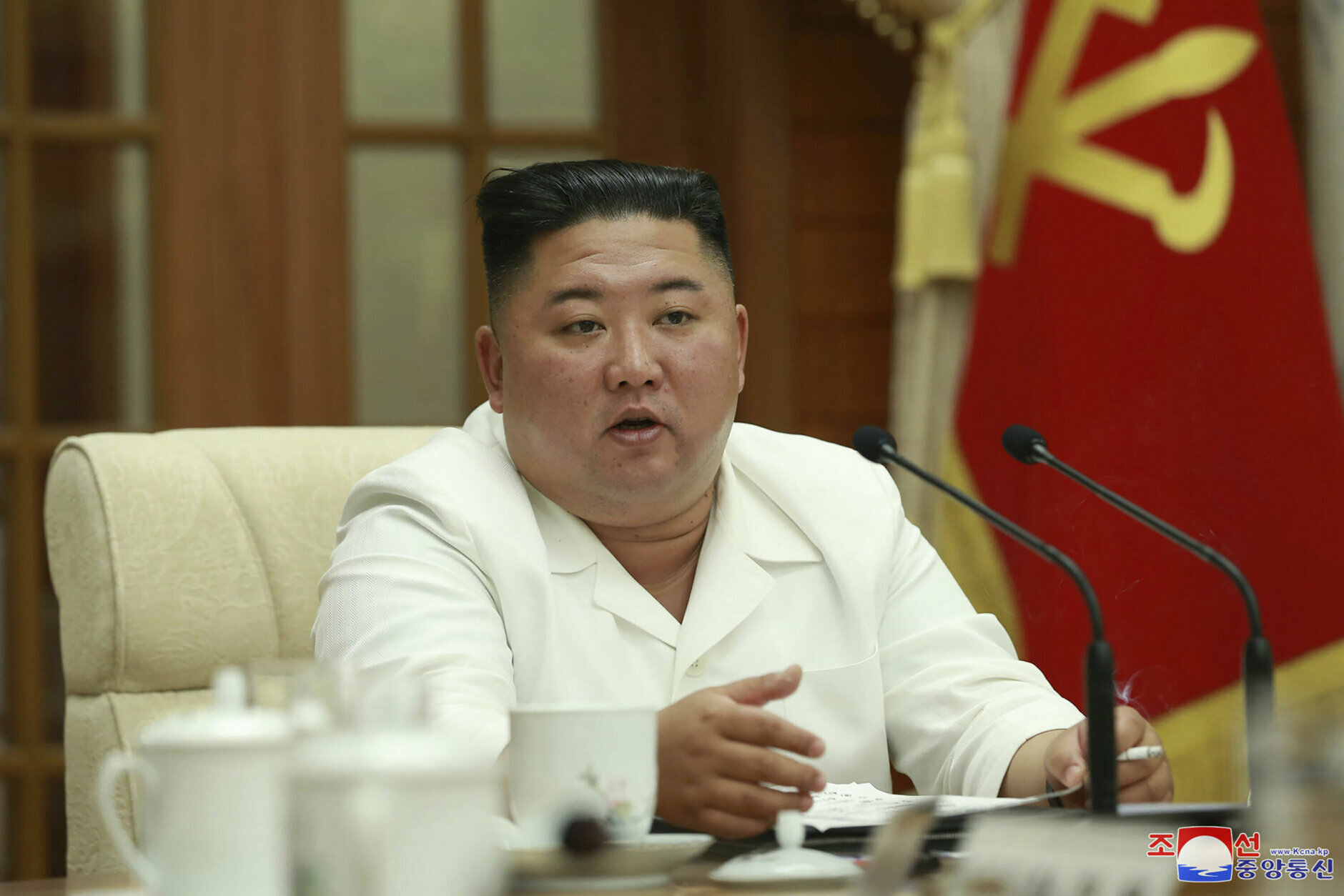 In this photo provided by the North Korean government, North Korean leader Kim Jong Un attends an enlarged meeting of the Politburo of the ruling Workers’ Party in Pyongyang, North Korea, Tuesday, Aug. 25, 2020. Independent journalists were not given access to cover the event depicted in this image distributed by the North Korean government. The content of this image is as provided and cannot be independently verified. Korean language watermark on image as provided by source reads: "KCNA" which is the abbreviation for Korean Central News Agency. (Korean Central News Agency/Korea News Service via AP)