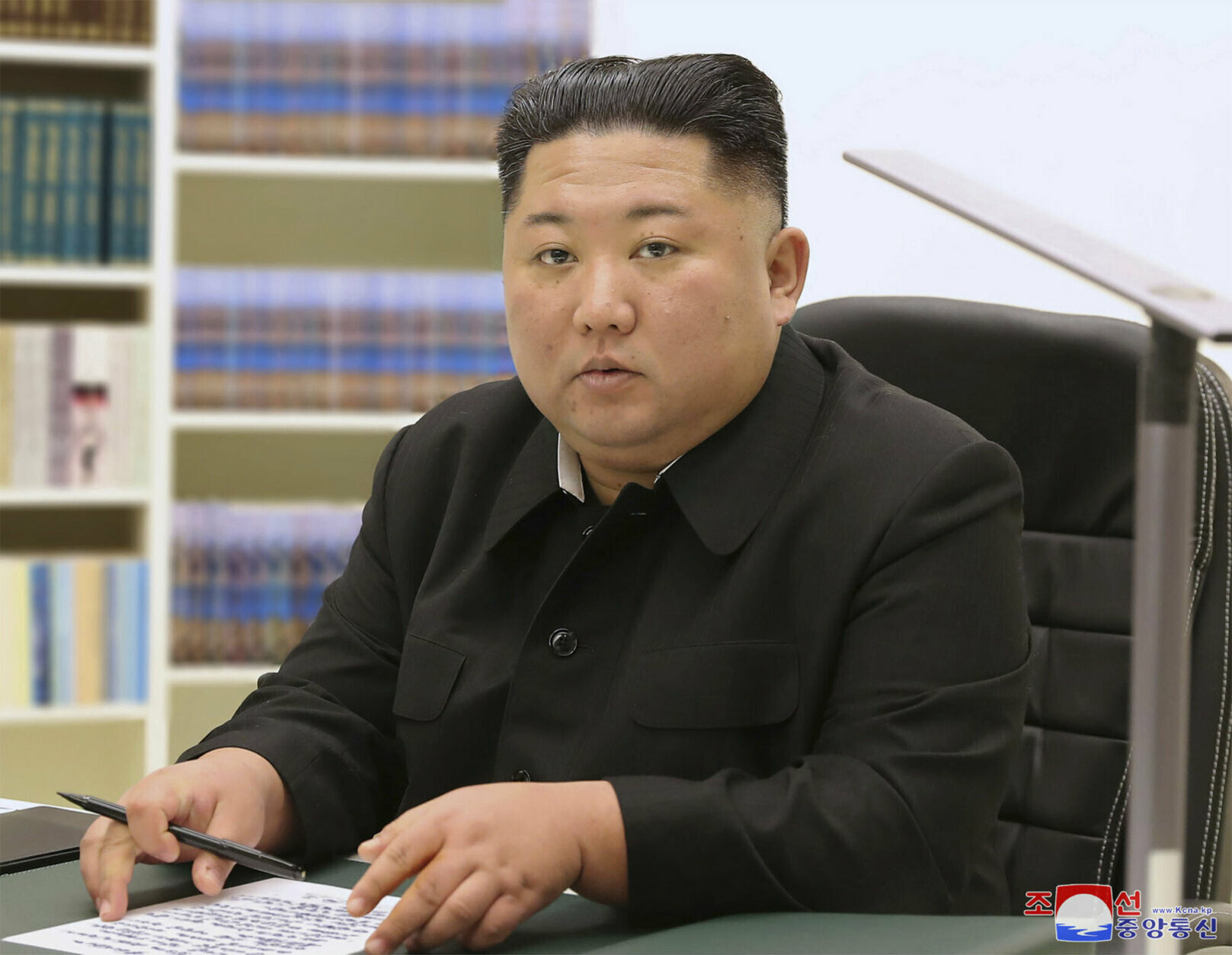 In this undated photo provided on Jan. 1, 2021, by the North Korean government, North Korean leader Kim Jong Un writes his New Year card to the public. Kim thanked the public for their trust and support “in the difficult times” and wished them happiness and good health in his first New Year’s Day cards sent to his people.Independent journalists were not given access to cover the event depicted in this image distributed by the North Korean government. The content of this image is as provided and cannot be independently verified. Korean language watermark on image as provided by source reads: "KCNA" which is the abbreviation for Korean Central News Agency.(Korean Central News Agency/Korea News Service via AP)