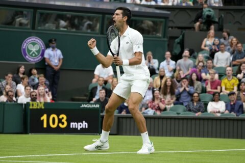 The Latest: Murray stages comeback to advance at Wimbledon