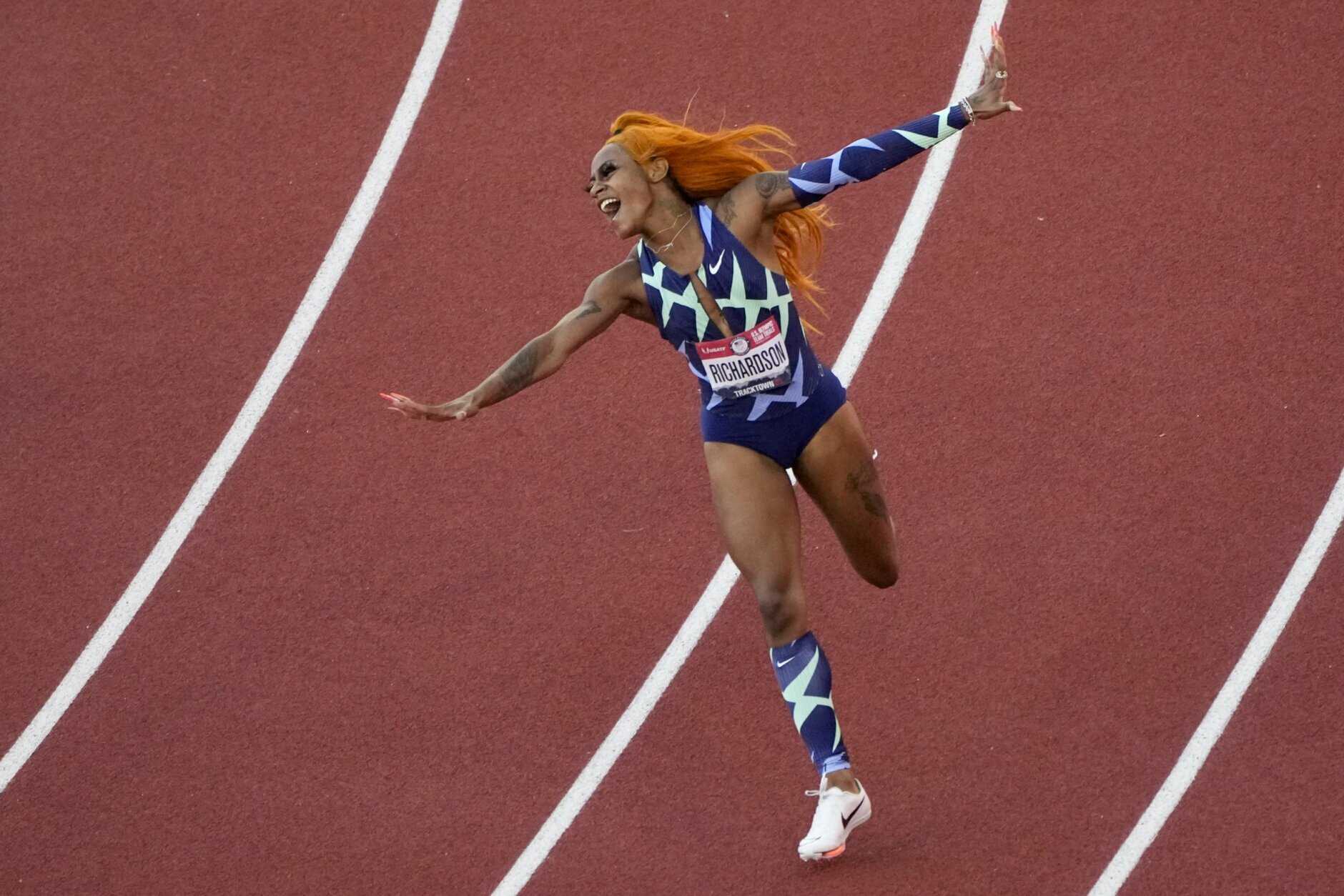 <p>Sha&#8217;Carri Richardson celebrates after winning the women&#8217;s 100-meter run at the U.S. Olympic Track and Field Trials Saturday, June 19, 2021, in Eugene, Oregon.</p>
