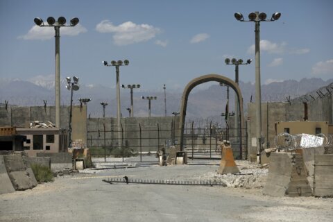 US vacates key Afghan base; pullout target now 'late August'