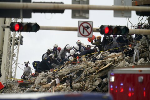 Latest victims in condo tower collapse include 2 children