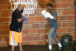 Two men sparring.