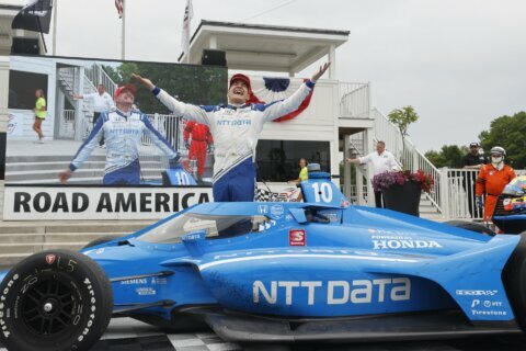 Palou makes late surge to win IndyCar race at Road America