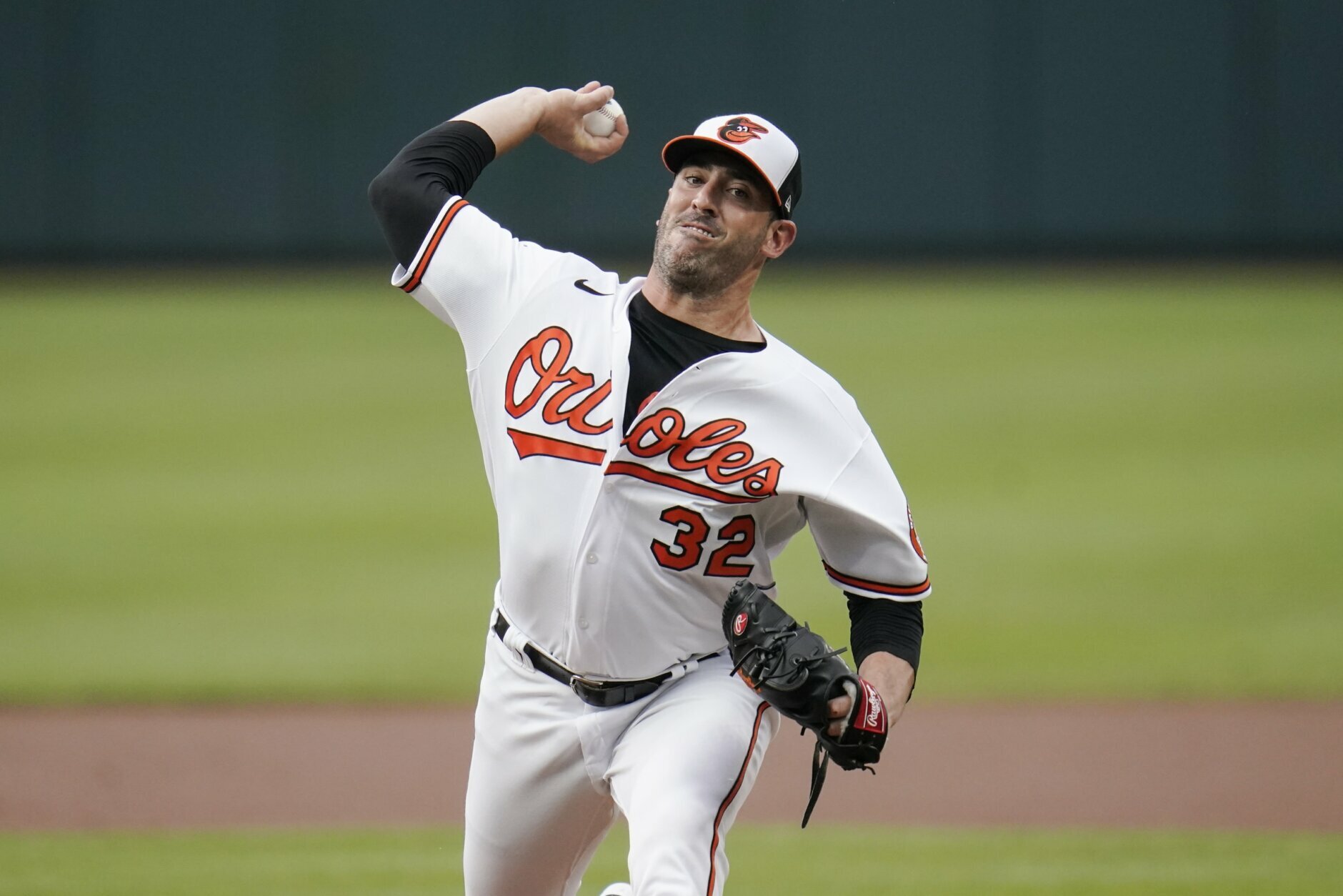 Baltimore Orioles starting pitcher Matt Harvey throws a pitch to the New York Mets during the first inning of a baseball game, Wednesday, June 9, 2021, in Baltimore. (AP Photo/Julio Cortez)
