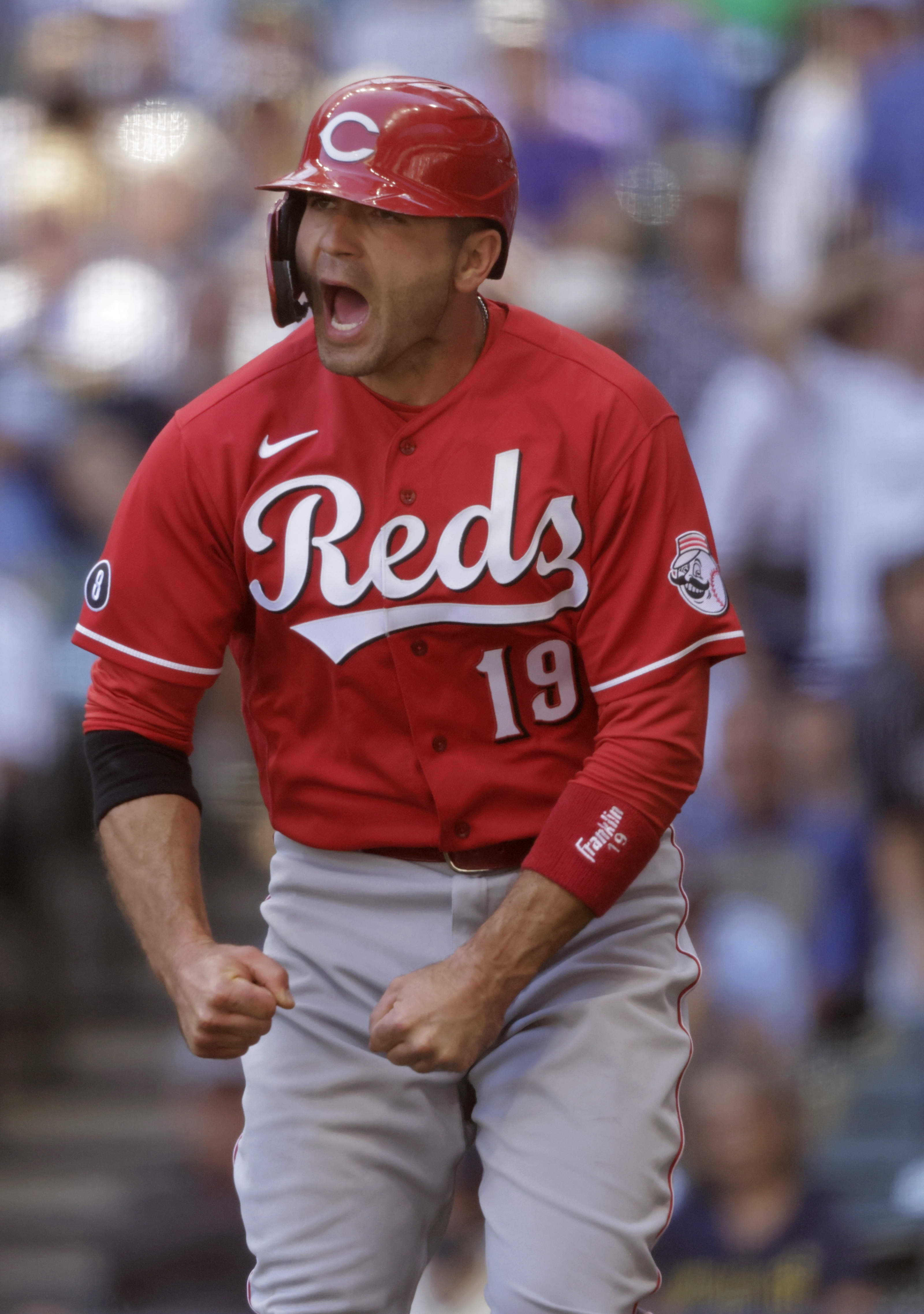 Joey Votto, his manager, and a fan get ejected in the 1st, a