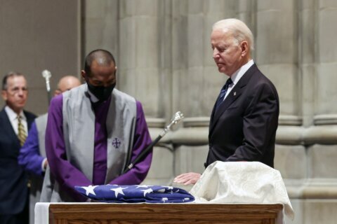 Biden mourns former Senate colleague, Virginia’s John Warner