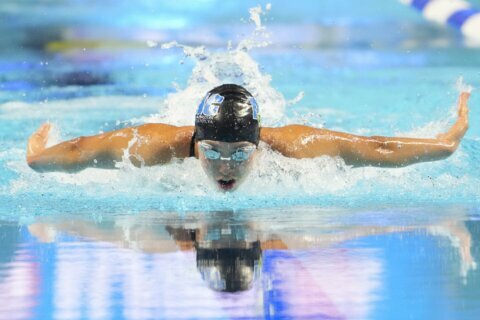 Arlington swimmer Torri Huske breaks American record in the 100m butterfly