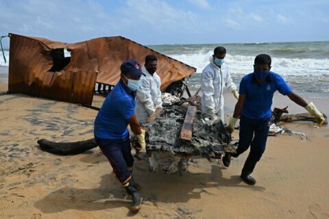 Fears of oil spill emergency as burnt cargo ship off Sri Lanka coast is now sinking