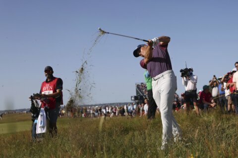 The Latest: Morikawa is the champion golfer of the year
