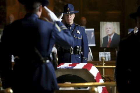 Final parade: Ex-Gov. Edwards carried to funeral site