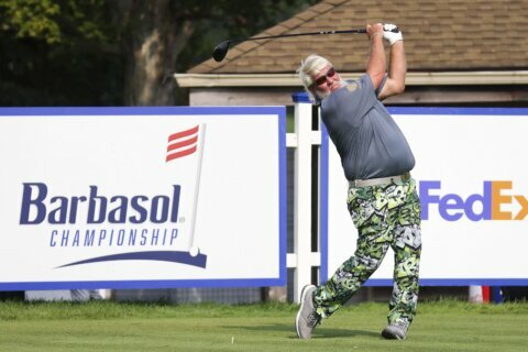 Brian Stuard shoots 64 to take lead in suspended Barbasol