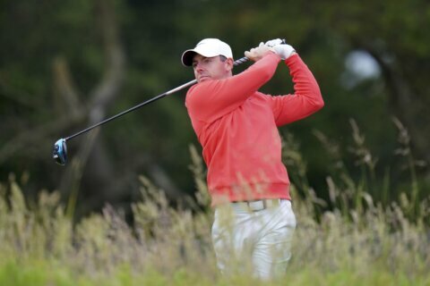 Spectator takes swing of McIlroy’s club at Scottish Open