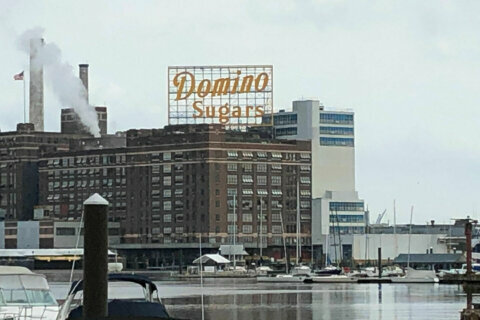 Iconic Domino Sugars sign relit in Baltimore
