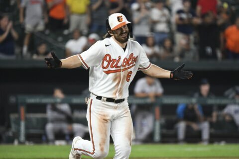 Orioles use 9th-inning walk to beat depleted Marlins 8-7