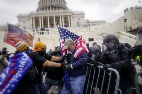 Capitol riot suspect from Va. charged with assaulting relative