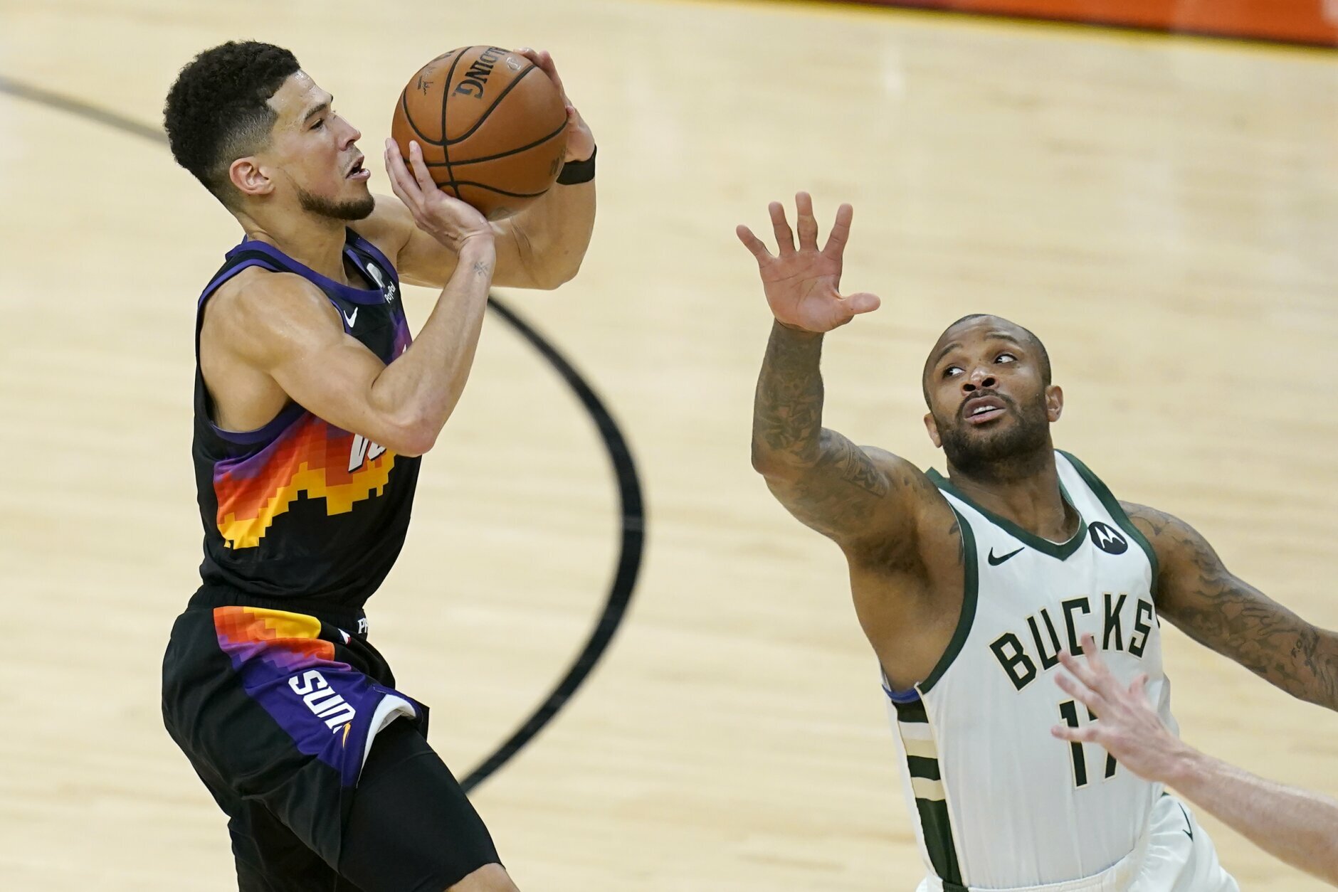 Booker's Suns career began with a push (and more) from P.J. Tucker