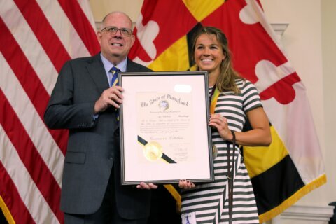 Maryland governor honors swimmer who withdrew from Paralympics