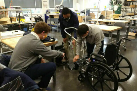 Maryland high schoolers build device allowing people in wheelchairs to walk their babies