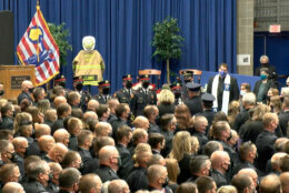 Mourners at the funeral service for Frederick County firefighter Joshua Laird at Mount St. Mary's University PNC Sports Complex.