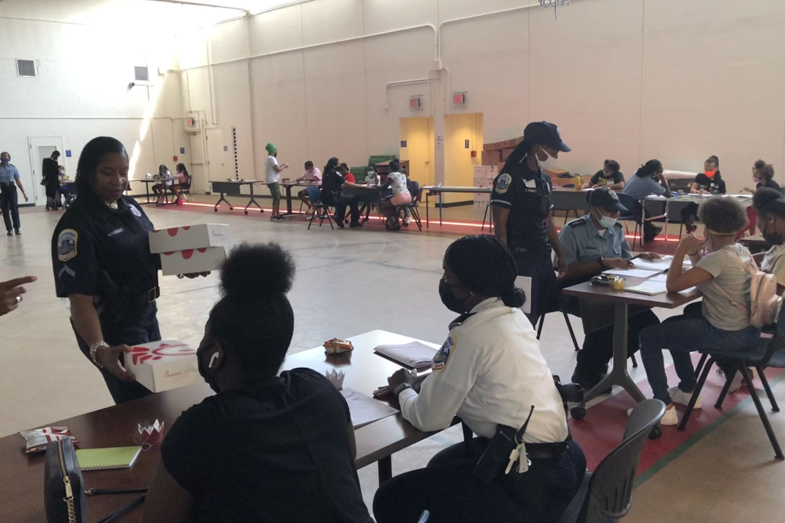 D.C. police hosted the "Think Like a Queen" back-to-school luncheon. (WTOP/Kristi King)