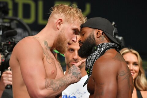 Jake Paul defeats Tyron Woodley in boxing match via split decision, hints at rematch