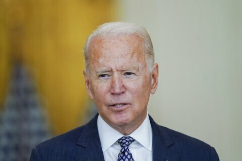 Biden sees dip in support amid new COVID cases: AP-NORC poll