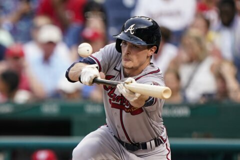 Albies, Swanson power Braves past Nationals 12-2