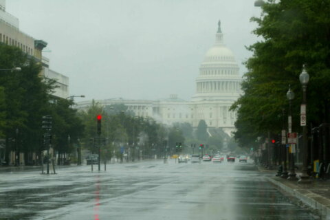Storms move out of DC region, spotty showers could pop up overnight
