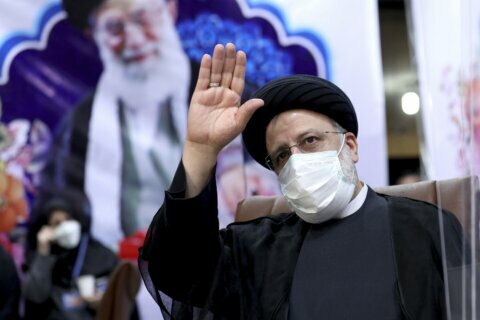 Analysis: Iran strikes hard-line pose ahead of new president