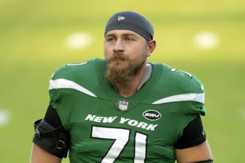 AP source: Jets OL Alex Lewis retiring from playing football