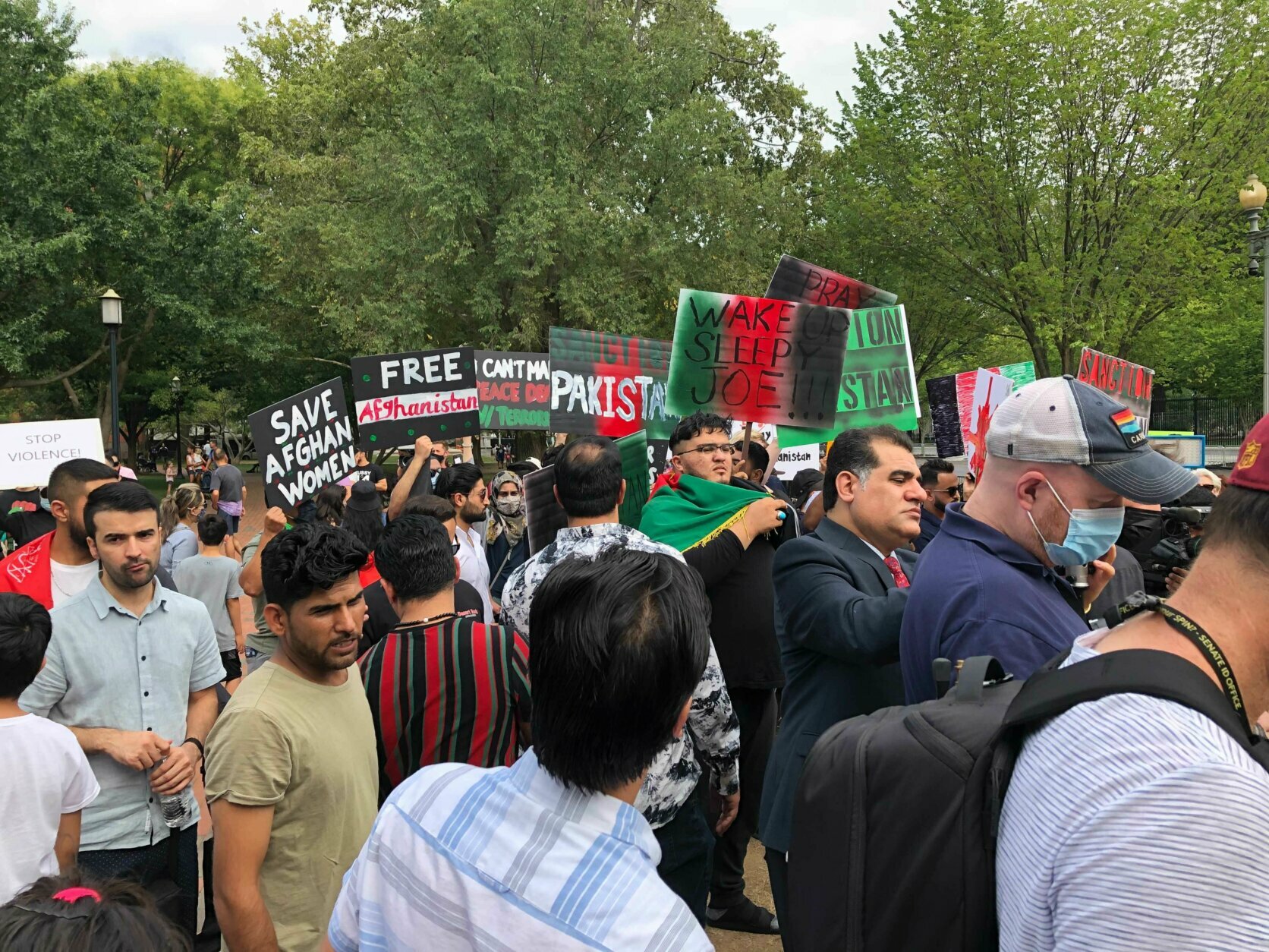 Protesters gather in front of the White House Sunday, Aug. 15, 2021, calling for support for Afghanistan after the Taliban ceased the capital, Kabul.