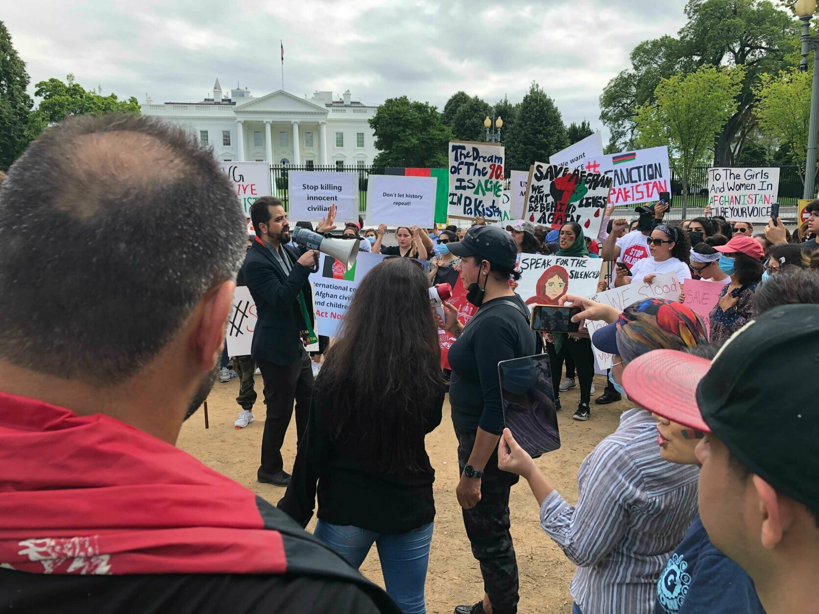 Protesters gather in Washington, D.C., Sunday, Aug. 15, 2021, calling for support for Afghanistan after the Taliban ceased the capital, Kabul.