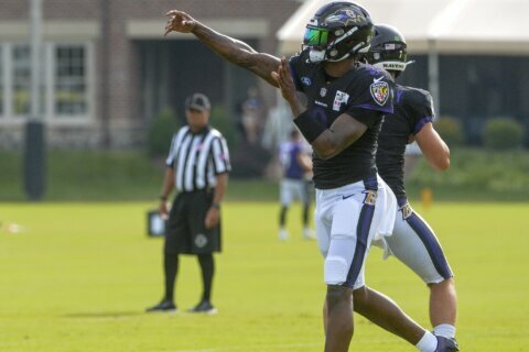 Jackson back at practice for Ravens after COVID-19 absence