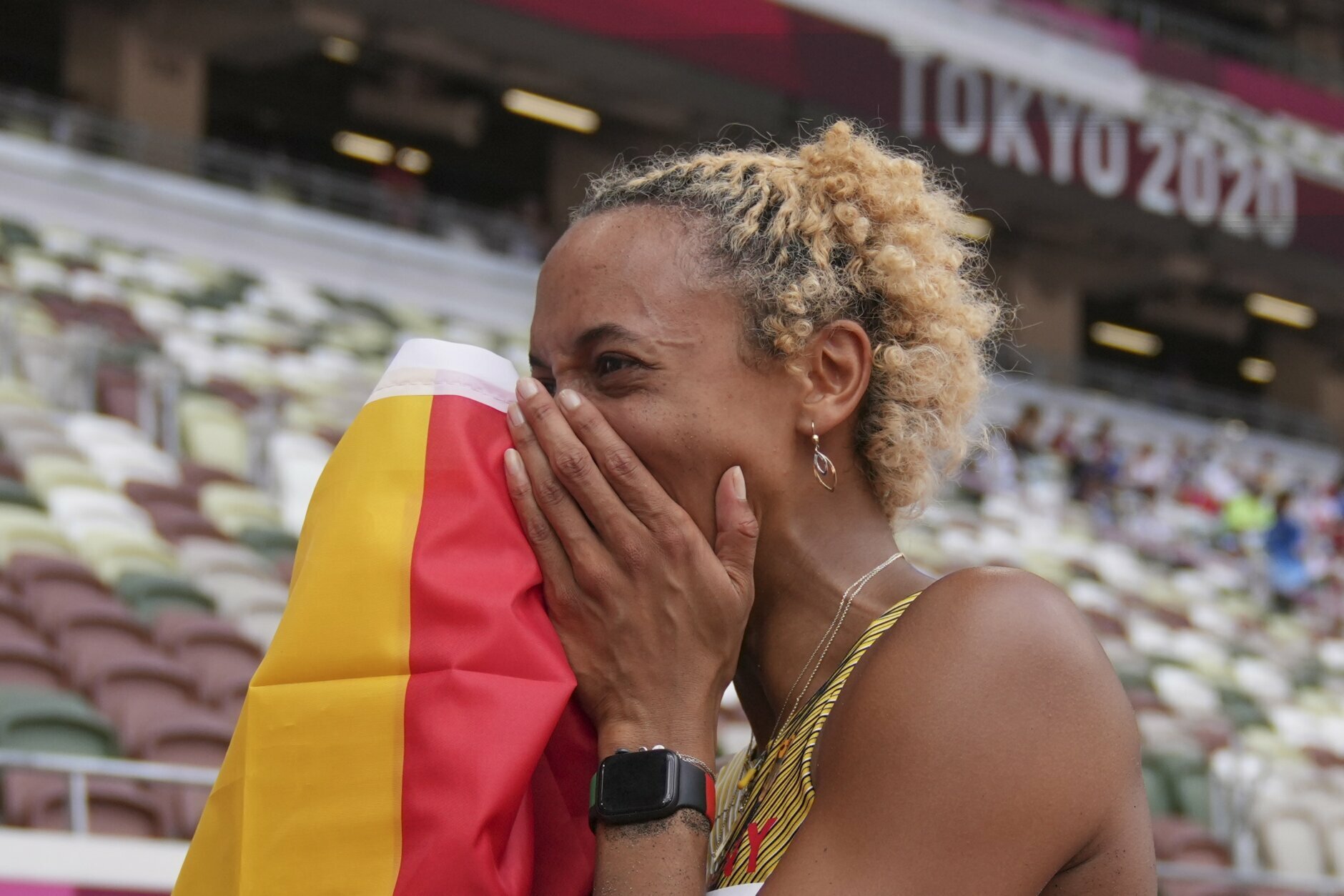 Malaika Mihambo, of Germany, celebrates after winning the gold medal in the women's long jump final at the 2020 Summer Olympics, Tuesday, Aug. 3, 2021, in Tokyo. (AP Photo/Matthias Schrader)