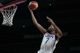 United States' Kevin Durant (7) scores during men's basketball gold medal game against France at the 2020 Summer Olympics, Saturday, Aug. 7, 2021, in Saitama, Japan. (AP Photo/Eric Gay)
