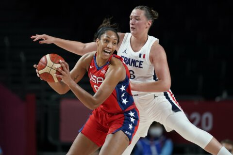Wilson leads US to quarters with 93-82 win over France